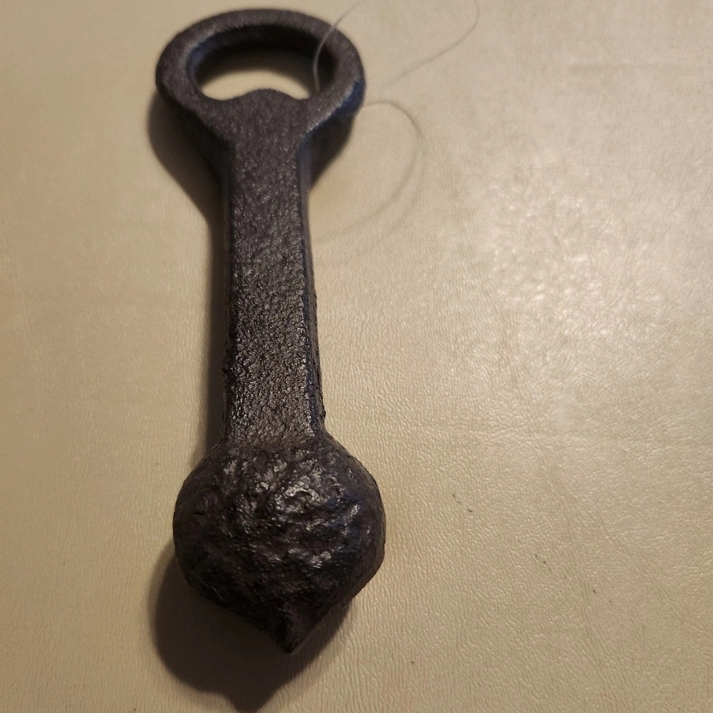 Vintage Black Cast Iron Bottle Opener